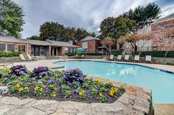 Two sparkling pools with sundeck